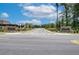 Community entrance boasts manicured landscaping and inviting street view, setting a welcoming tone at 1602 Dover Creek Ln, Lawrenceville, GA 30045