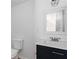 Bathroom with white countertops, a modern vanity, and fixtures at 1907 Clarke Ln, Decatur, GA 30035