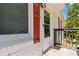 Close-up of the front porch, featuring a white door and brick facade at 1907 Clarke Ln, Decatur, GA 30035