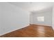 Bright living room featuring hardwood floors and natural light at 1907 Clarke Ln, Decatur, GA 30035