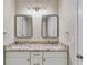 Modern bathroom with double sinks, granite countertop and stainless steel faucets at 351 Chandler Bluff Ct, Grayson, GA 30017