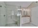 Bathroom featuring a large shower, white tile, granite countertop, and updated fixtures at 351 Chandler Bluff Ct, Grayson, GA 30017