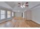 Spacious bedroom with tray ceilings, fan, and lots of natural light at 351 Chandler Bluff Ct, Grayson, GA 30017