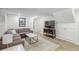 Finished basement with sectional sofa, modern furniture, and home entertainment setup at 3562 Sunderland Ne Cir, Atlanta, GA 30319