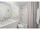Bright bathroom offers tile shower, separate tub and shower, and white countertops at 3562 Sunderland Ne Cir, Atlanta, GA 30319
