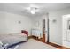 Cozy bedroom with hardwood floors and an adjacent bathroom and closet at 3562 Sunderland Ne Cir, Atlanta, GA 30319