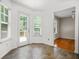 Sunny breakfast nook features tiled floors, a door to the outside deck and views of the backyard at 3927 Villager Way, Rex, GA 30273