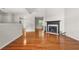 Inviting living room features a cozy fireplace, hardwood floors, and natural light at 3927 Villager Way, Rex, GA 30273
