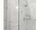 Elegant shower features a glass door and pristine white tile at 3927 Villager Way, Rex, GA 30273