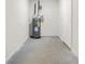 This utility room features a water heater and a door to the right at 3927 Villager Way, Rex, GA 30273