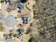Aerial view features home with mature trees providing a peaceful and private setting, great curb appeal at 7430 Valley Landing Ct, Cumming, GA 30041