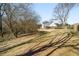 Expansive backyard features lush greenery and a charming exterior, perfect for outdoor enjoyment at 7430 Valley Landing Ct, Cumming, GA 30041