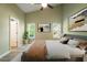 Cozy bedroom with plush bedding, artwork, and natural light from multiple windows at 7430 Valley Landing Ct, Cumming, GA 30041