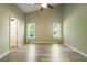 Spacious bedroom with ample natural light, hardwood flooring, and a vaulted ceiling at 7430 Valley Landing Ct, Cumming, GA 30041