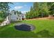 Expansive green lawn in the backyard of this modern farmhouse, perfect for outdoor activities at 819 Loridans Ne Dr, Atlanta, GA 30342
