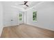 Spacious bedroom features tray ceiling, hardwood floors, and natural light at 819 Loridans Ne Dr, Atlanta, GA 30342