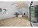 Spacious kitchen with modern appliances, a large island, and folding glass doors at 819 Loridans Ne Dr, Atlanta, GA 30342