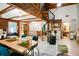 Bright playroom with wooden floors, spiral stairs, and plenty of room for activities at 1326 Janmar Rd, Snellville, GA 30078