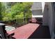 Relax on this spacious deck with views of the backyard and surrounding greenery at 545 Chaseridge Dr, Mcdonough, GA 30253