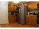 Functional kitchen featuring wood cabinets, stainless steel appliances, and a practical design for everyday cooking at 545 Chaseridge Dr, Mcdonough, GA 30253