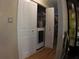 A laundry closet showing the washer and dryer behind folding doors at 545 Chaseridge Dr, Mcdonough, GA 30253
