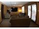 Cozy living room with multiple seating options, a flat-screen TV, and plenty of natural light at 545 Chaseridge Dr, Mcdonough, GA 30253