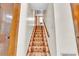 A carpeted staircase adds character to the interior, with a wooden handrail at 9082 Chestnut Lake Dr, Jonesboro, GA 30236