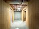 Unfinished basement with stud walls offers plenty of potential storage space at 2585 Chandler Grove Dr, Buford, GA 30519