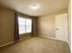 Bedroom features natural light and carpet at 2585 Chandler Grove Dr, Buford, GA 30519