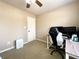 Bedroom featuring ceiling fan, natural light, and neutral walls at 2585 Chandler Grove Dr, Buford, GA 30519
