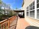 Large wooden deck with a gazebo, offering ample space for relaxing and enjoying the scenery at 2585 Chandler Grove Dr, Buford, GA 30519