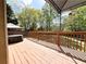 Covered deck offering scenic views and shade, an ideal spot for relaxation and outdoor dining at 2585 Chandler Grove Dr, Buford, GA 30519