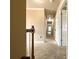 Hallway of home featuring carpeted floor and white doors at 2585 Chandler Grove Dr, Buford, GA 30519