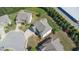 Aerial view of a well-maintained home with a landscaped yard and grey roof at 4250 Harrison Lndg, Cumming, GA 30041