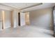 Carpeted bedroom featuring recessed lights, closet and a neutral color palette at 4250 Harrison Lndg, Cumming, GA 30041