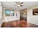 Sunlit breakfast nook with hardwood floors and an adjacent doorway to the deck at 4250 Harrison Lndg, Cumming, GA 30041