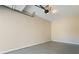 Clean garage with epoxy floors, overhead door, and new automatic door opener at 4250 Harrison Lndg, Cumming, GA 30041