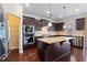 Modern kitchen featuring stainless steel appliances, granite countertops, and a center island with pendant lighting at 4250 Harrison Lndg, Cumming, GA 30041