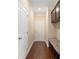 Hallway with convenient storage cabinets and a padded bench at 4250 Harrison Lndg, Cumming, GA 30041