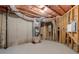 Unfinished basement space with exposed utilities, perfect for customization at 4250 Harrison Lndg, Cumming, GA 30041