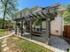 Covered patio with outdoor seating, offers a relaxing space for entertaining and enjoying the backyard at 6010 Silver Lace Nw Ln, Acworth, GA 30101