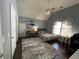 Cozy bedroom with vaulted ceiling, neutral paint, and a ceiling fan at 6010 Silver Lace Nw Ln, Acworth, GA 30101