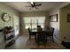 Bright breakfast nook features a cozy table set near a door offering view of the backyard at 6010 Silver Lace Nw Ln, Acworth, GA 30101