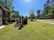 Well maintained lawn with landscaped flowerbeds and green shrubs at 6010 Silver Lace Nw Ln, Acworth, GA 30101