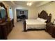 Serene main bedroom with a king-size bed and ample space and an attached office space at 6010 Silver Lace Nw Ln, Acworth, GA 30101