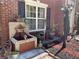 Charming water fountain in a garden setting, adds character to this brick home's landscape at 6010 Silver Lace Nw Ln, Acworth, GA 30101