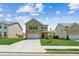 Charming two-story brick home with an attached garage and a well-manicured front yard at 814 Lakehaven Ln, Loganville, GA 30052