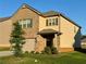 Charming two-story home features brick and siding exterior with well-maintained lawn at 814 Lakehaven Ln, Loganville, GA 30052