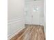 Bright foyer with beautiful wood flooring and decorative wall trim at 814 Lakehaven Ln, Loganville, GA 30052