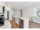 Bright, open kitchen featuring a stainless steel dishwasher, appliances, and white countertops at 814 Lakehaven Ln, Loganville, GA 30052
